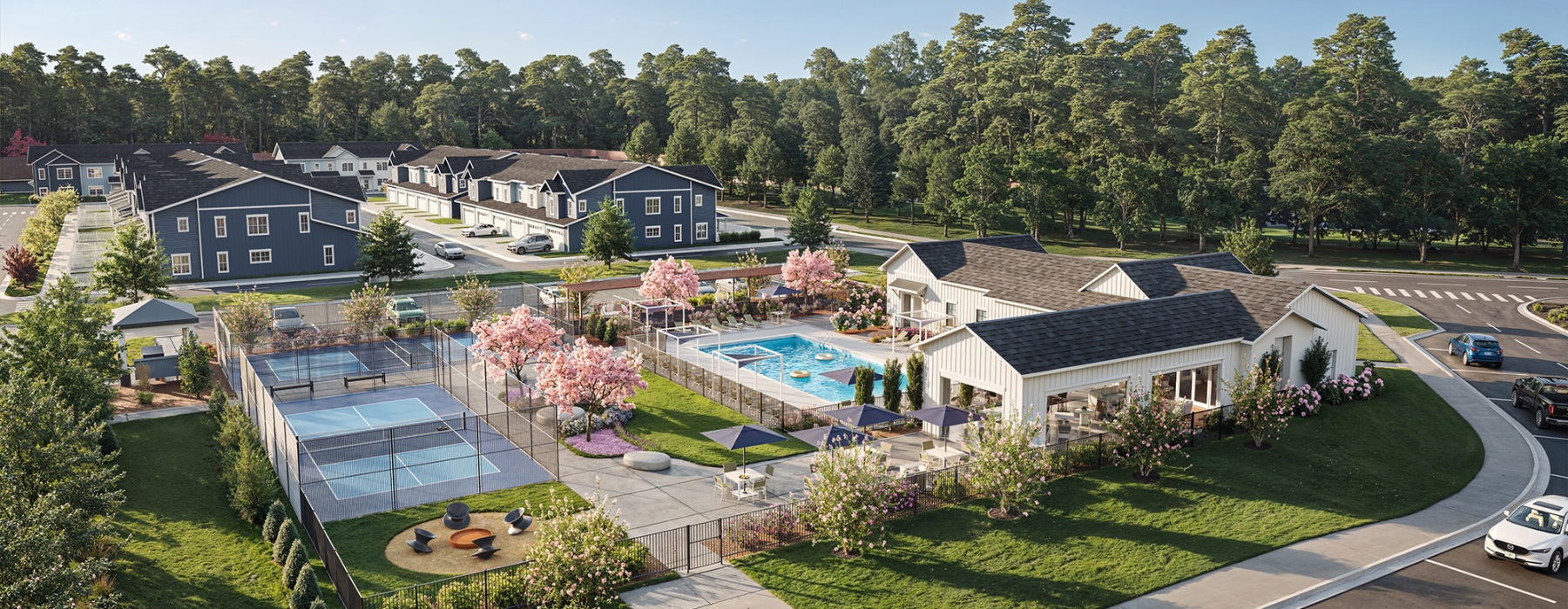 Aerial rendering of planned community amenities at Oaks at Wendell, including a pool, clubhouse, and outdoor recreation spaces.